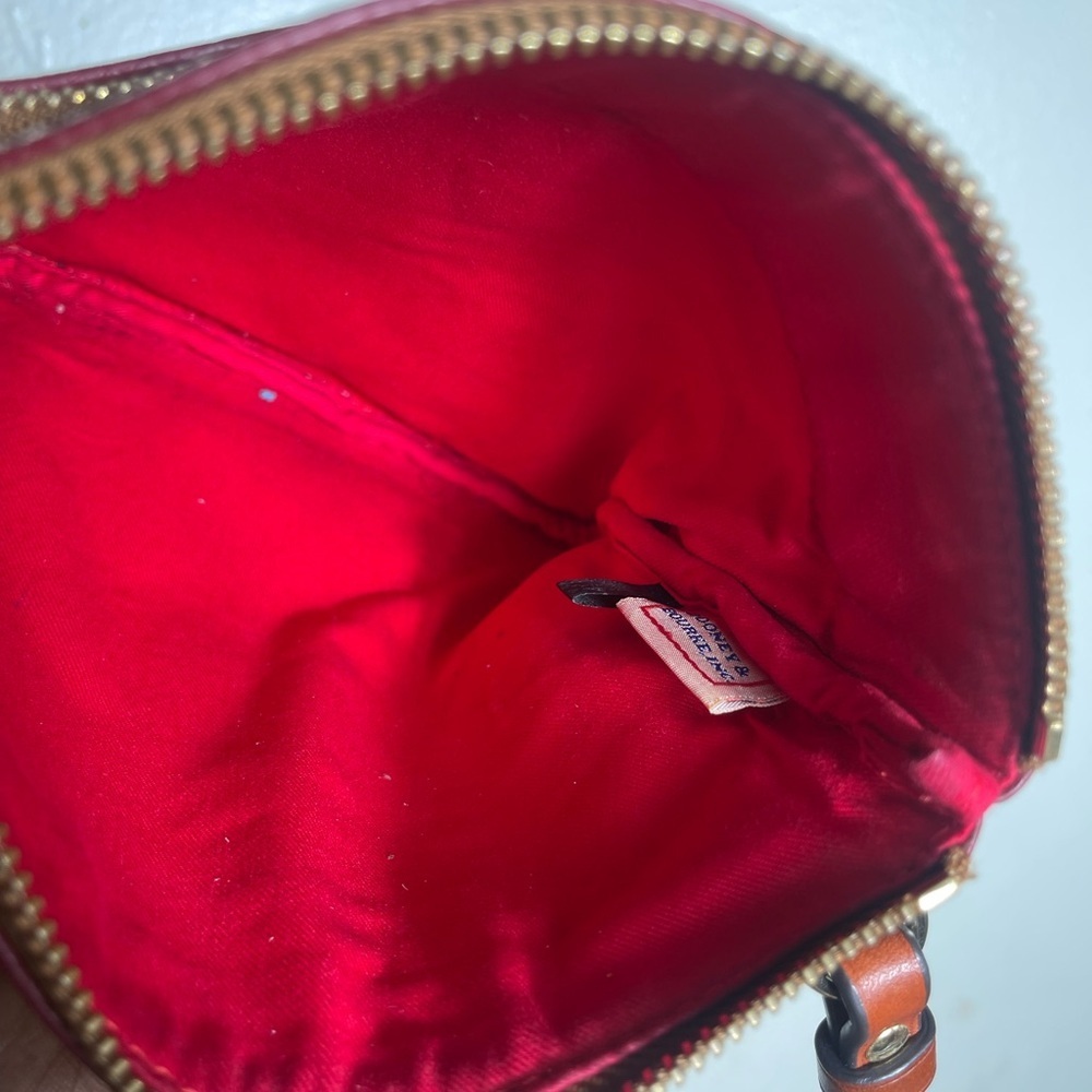 Dooney Bourke  burgundy  grain North South Triple Zip Crossbody (gently loved) - Picture 8 of 8